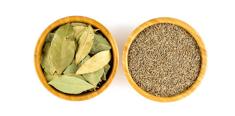 Aerial of bay leaves with cumin spice