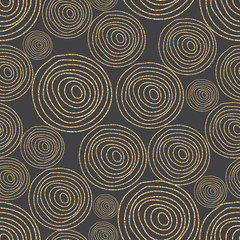 Glitter shimmer spiral circles seamless pattern gold on black.