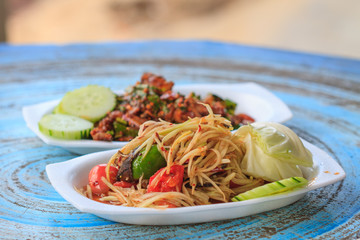 papaya salad with Thai cuisine spicy pork salad