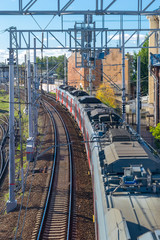 Obraz premium train station and moving train