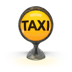 illuminated taxi sign on a vintage headlight