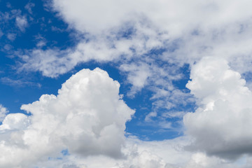 White cloud in the blue sky, view from bottom up