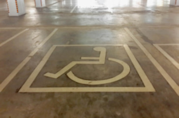 Handicap parking areas reserved for disabled people, blurred