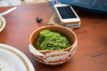 green seaweed in ceramic bowl , Thai dish table