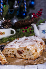 Fototapeta na wymiar German Christmas cake Stollen with dry fruits and nuts