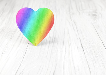 Rainbow colors heart on white background, space for text