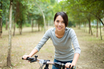 Naklejka premium Woman enjoy cycling