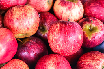 Fresh red ripe apples background