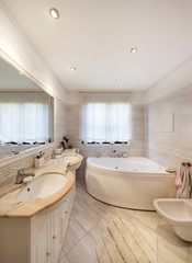 Bathroom of a modern apartment, marble cladding