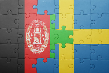 puzzle with the national flag of sweden and afghanistan