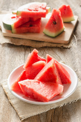 sliced watermelon on white dish