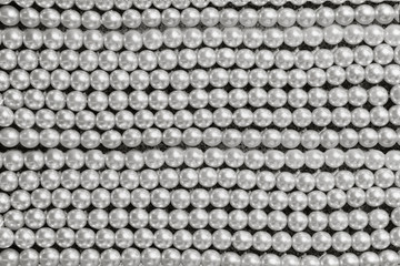 background string of  large gray pearls closeup