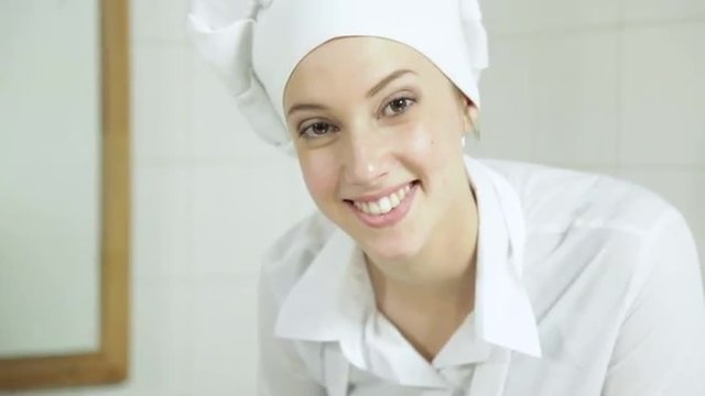 Young chef decorating delicious dessert&nbsp;
