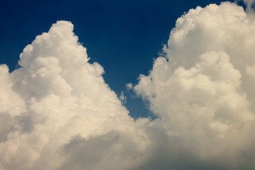 Puffy Clouds in Blue Sky