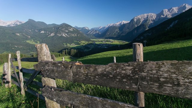 Austria, Lofer Timelapse of slipping Wooden Fence with Mountains