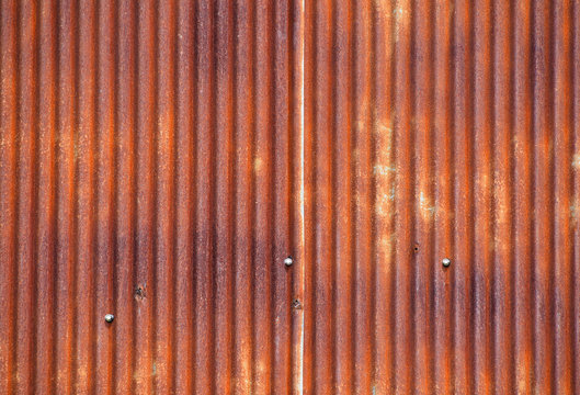 Old bright rust corroded metal goffered surface