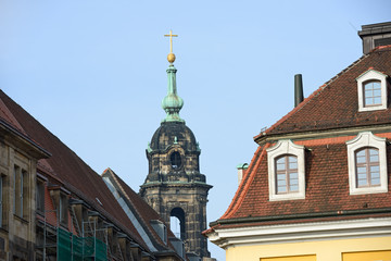 Fototapeta na wymiar Roofs of Keuzstrasse Street with Kreuzkirche Church in Dresden,