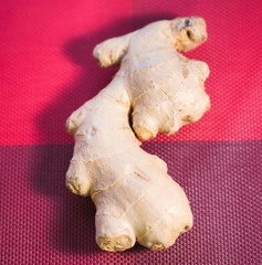 Ginger or fresh ginger on a background