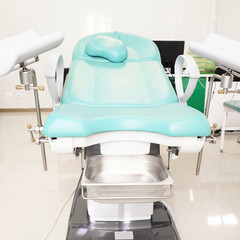 Gynecological chair in gynecological room