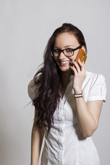 Young beautiful woman with mobile phone