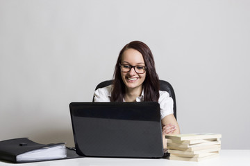 Young beautiful businesswoman at office