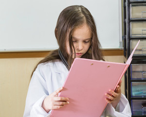 Child doctor with a folder