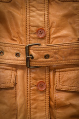 Texture a shabby brown leather jacket.