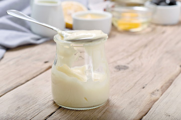 Homemade mayonnaise in glass jar