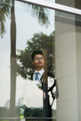 Businessman at window