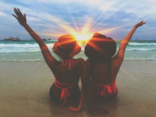 friend chilling on beach