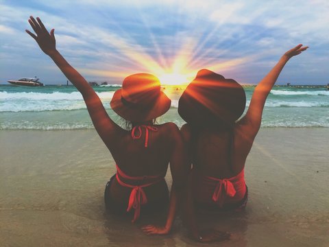 friend chilling on beach