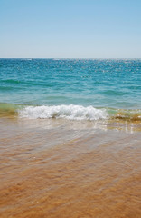 Portugal sea shore with waves on the beach
