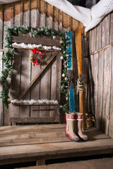 wooden skis standing near the porch