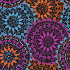 Ornamental circle pattern on black background. Mandala. For wrapping, wallpaper, textile