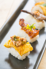 omelet with spicy pork sushi