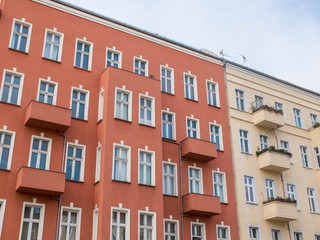 Fototapeta na wymiar Apartment Buildings with Small Balconies