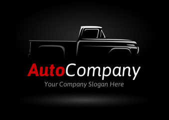 Auto company logo design concept with classic pickup motor vehicle silhouette on black background. Vector illustration... © JoelMasson