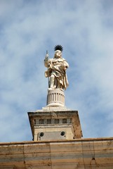 Fototapeta na wymiar Statue on top of Cadiz Cathedral.