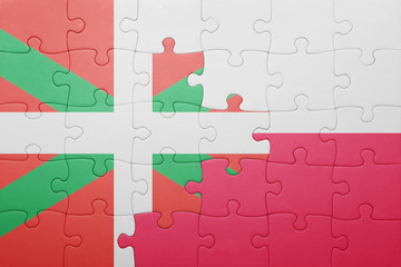 puzzle with the national flag of basque country and poland