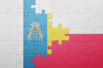 puzzle with the national flag of canary islands and poland