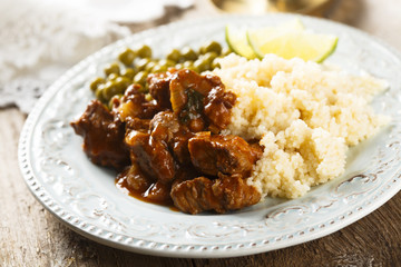 Beef stew with couscous and peas