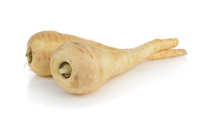 Fototapeta premium fresh parsnip roots on a white background