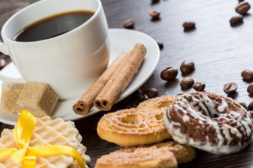 Biscuits and coffee on table