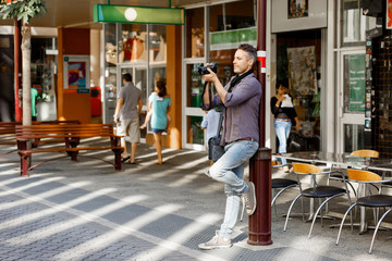 Male photographer taking picture