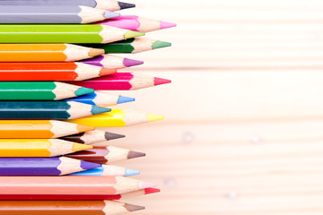 Group of color pencils select focus