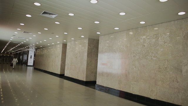 Man walks down the hall in sports corridors of life
