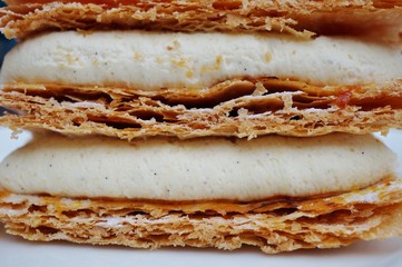Mille-feuille French pastry (Napoleon) with light vanilla cream and crunchy caramelized top