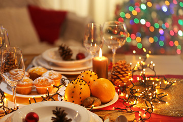 Christmas table setting with holiday decorations