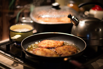 Frying hot silesian cutlet