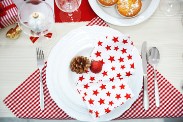 Christmas table setting with holiday decorations